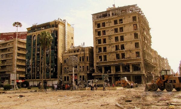 Nach Bombenanschlägen zerstörte Häuser in Syrien. Foto: Wikimedia